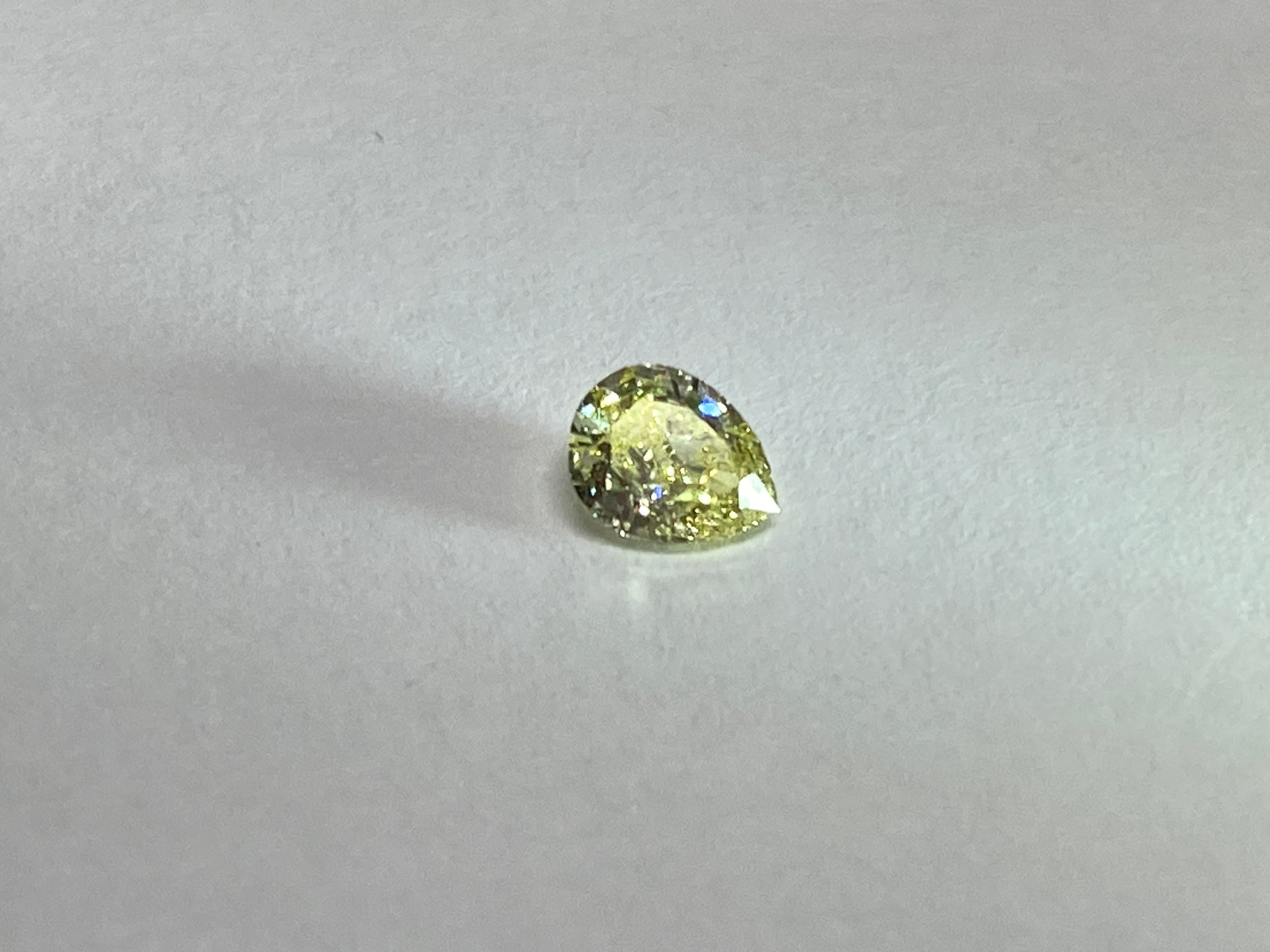 イエローダイヤモンド FANCYYELLOW VS-1 ペアシェープカット 0.336ct DA-009