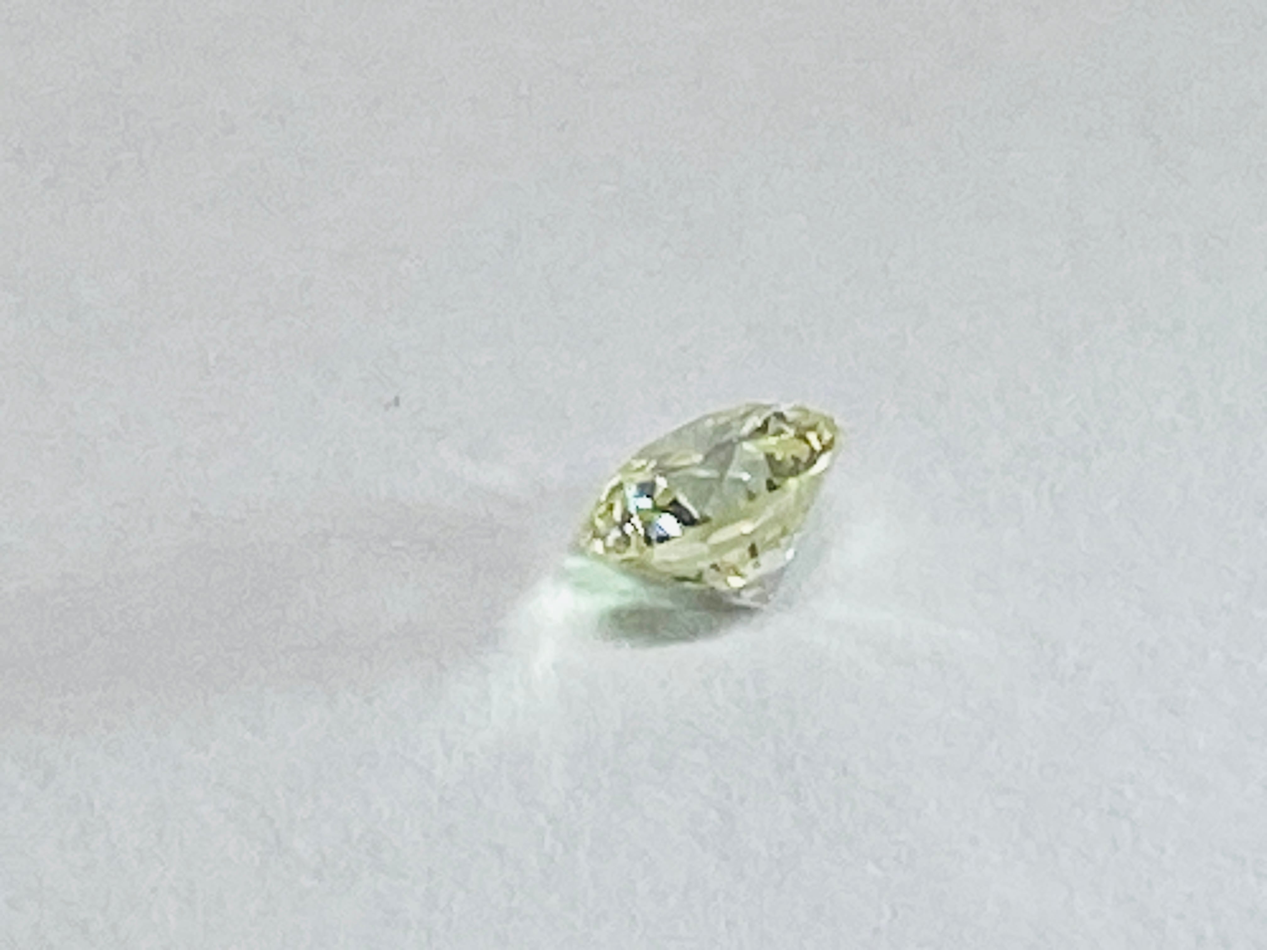 イエローダイヤモンド　FANCYYELLOW　VS-1　ペアシェープカット　0.336ｃｔ　DA-009
